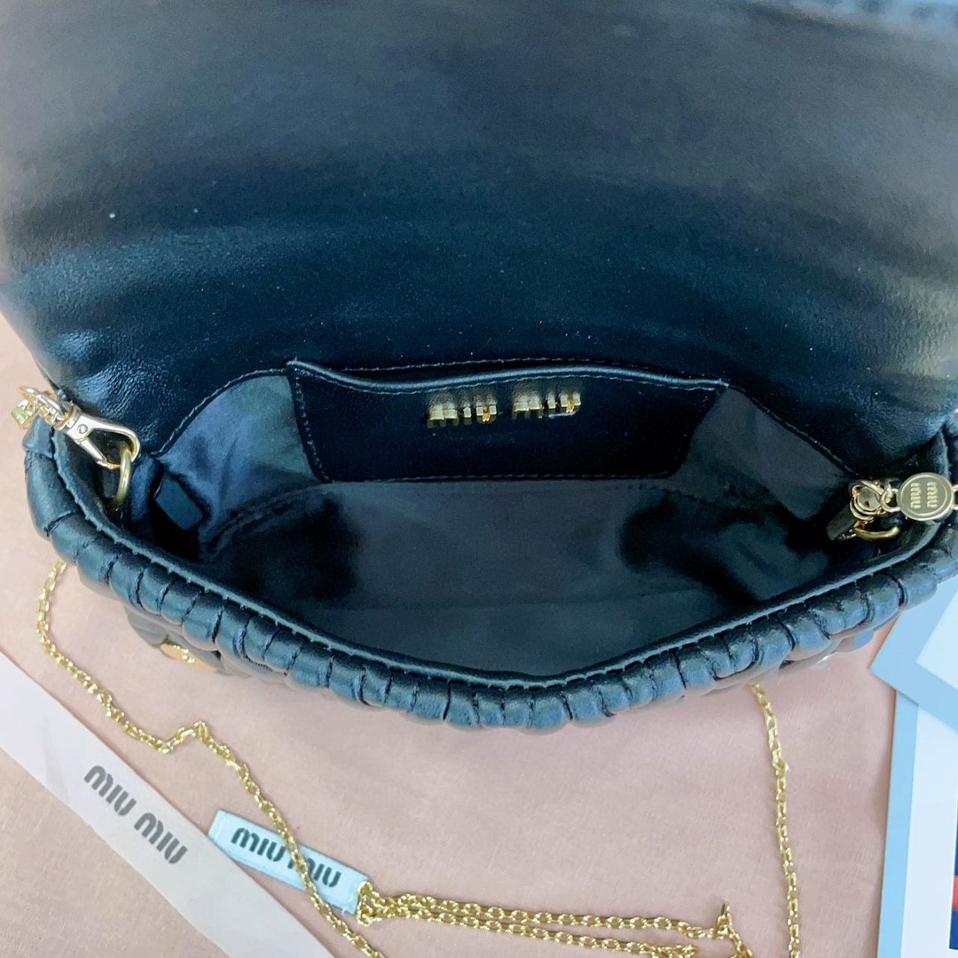 Miu Miu 5BP086_N88_F0002_V_COO Matelassé nappa leather mini-bag black M1