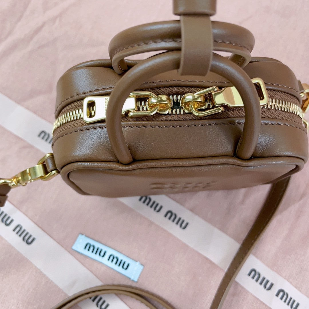 Miu Miu 5NR020 Leather micro bag caramel M1
