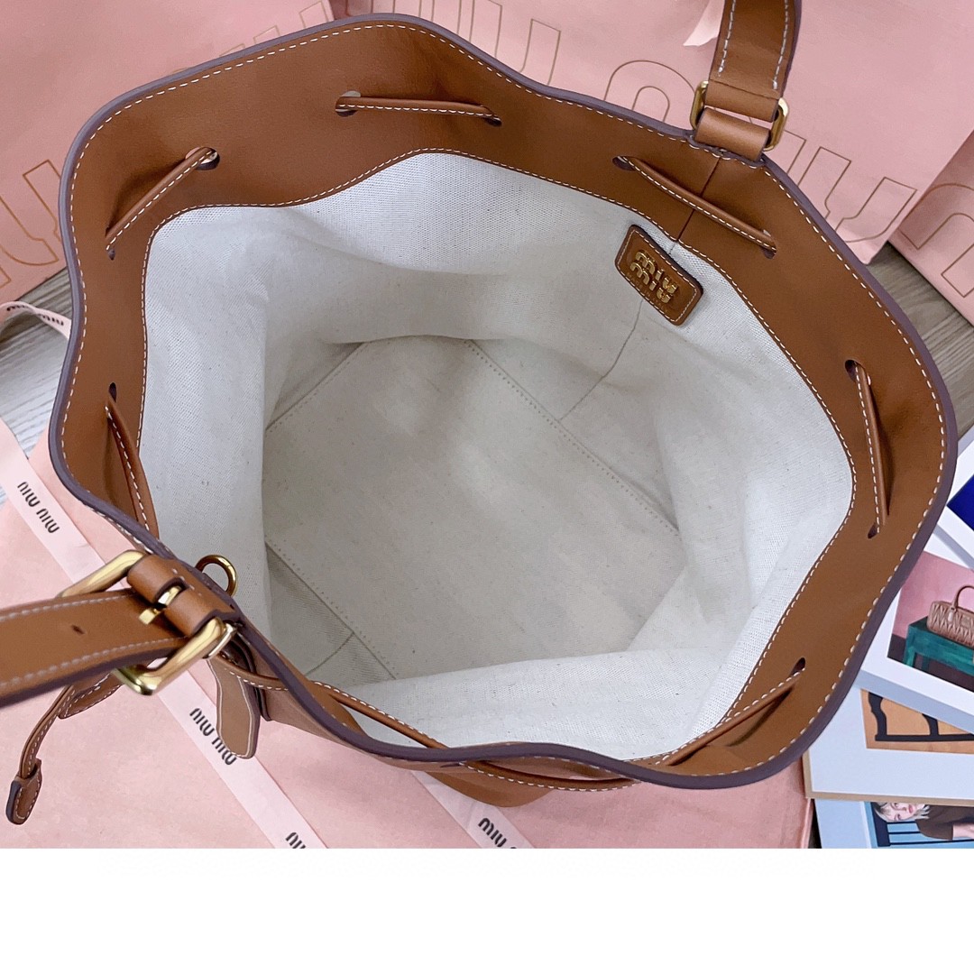 Miu Miu leather bucket bag cognac 5BE089_2CRM_F0046_V_OOO M1