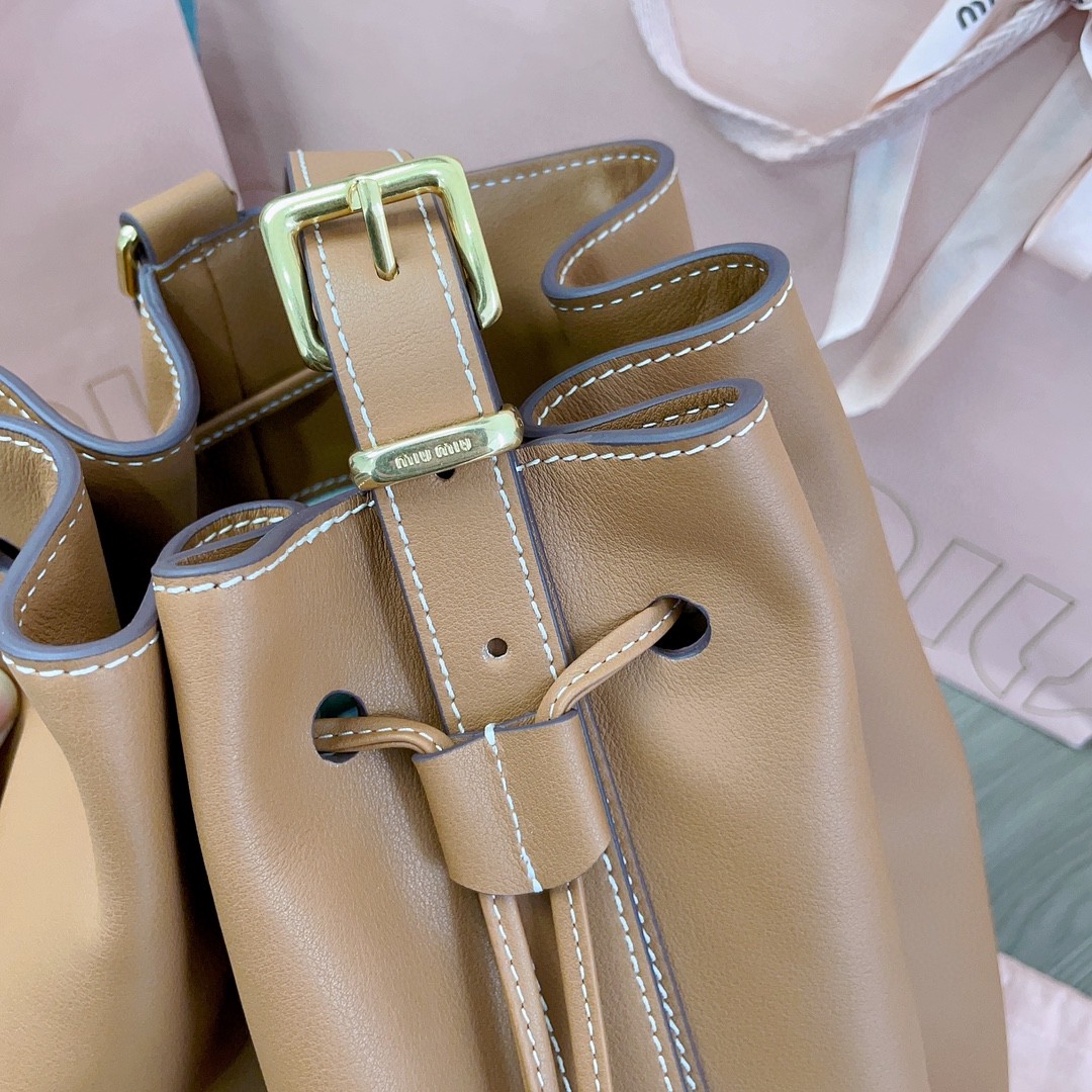 Miu Miu leather bucket bag cognac 5BE089_2CRM_F0046_V_OOO M1