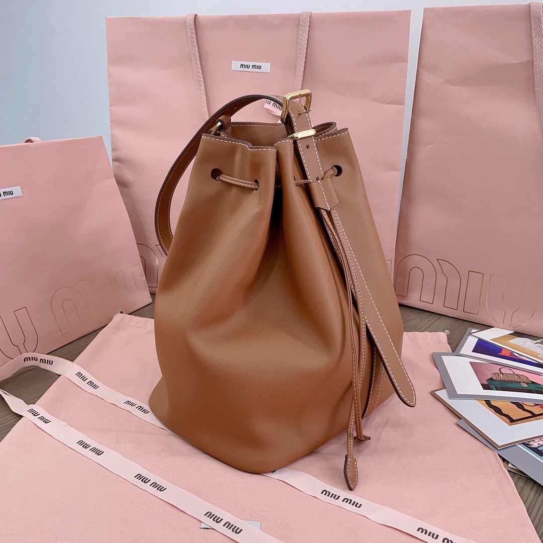 Miu Miu leather bucket bag cognac 5BE089_2CRM_F0046_V_OOO M1