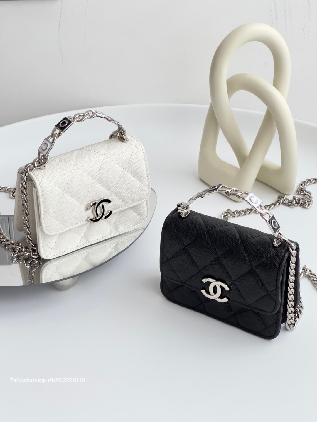 CHANEL 22S FLAP BAG WITH TOP HANDLE Grained calfskin dark-Tone Metal White/black
