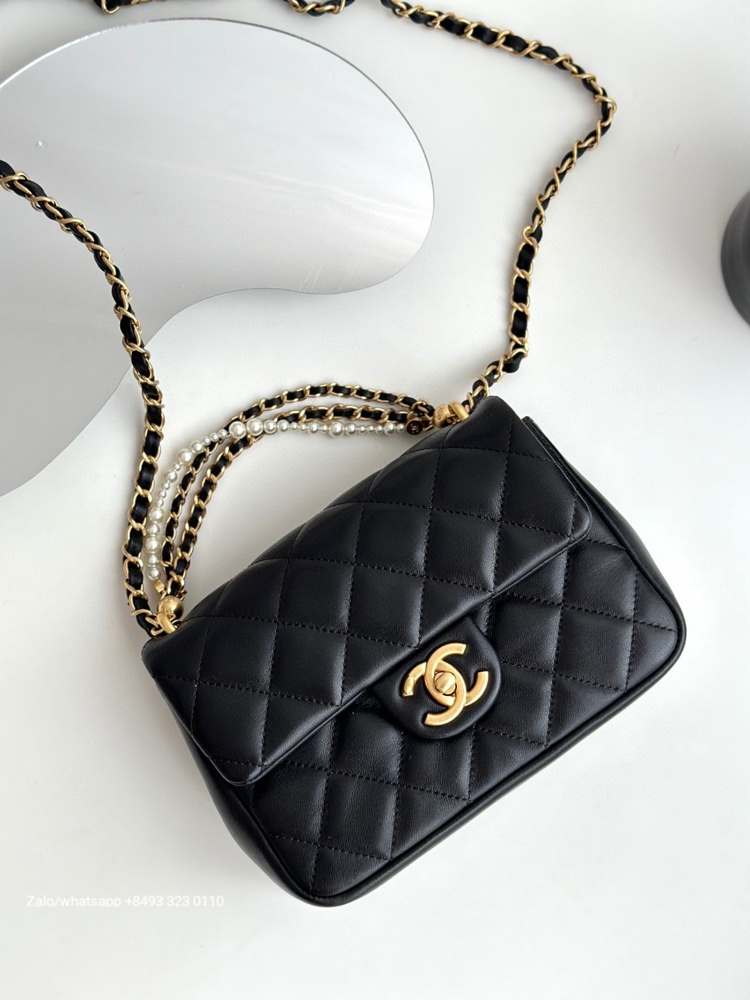 CHANEL Small FLAP BAG WITH TOP HANDLE Shiny Lambskin, Imitation Pearls & Gold-Tone Metal Black
