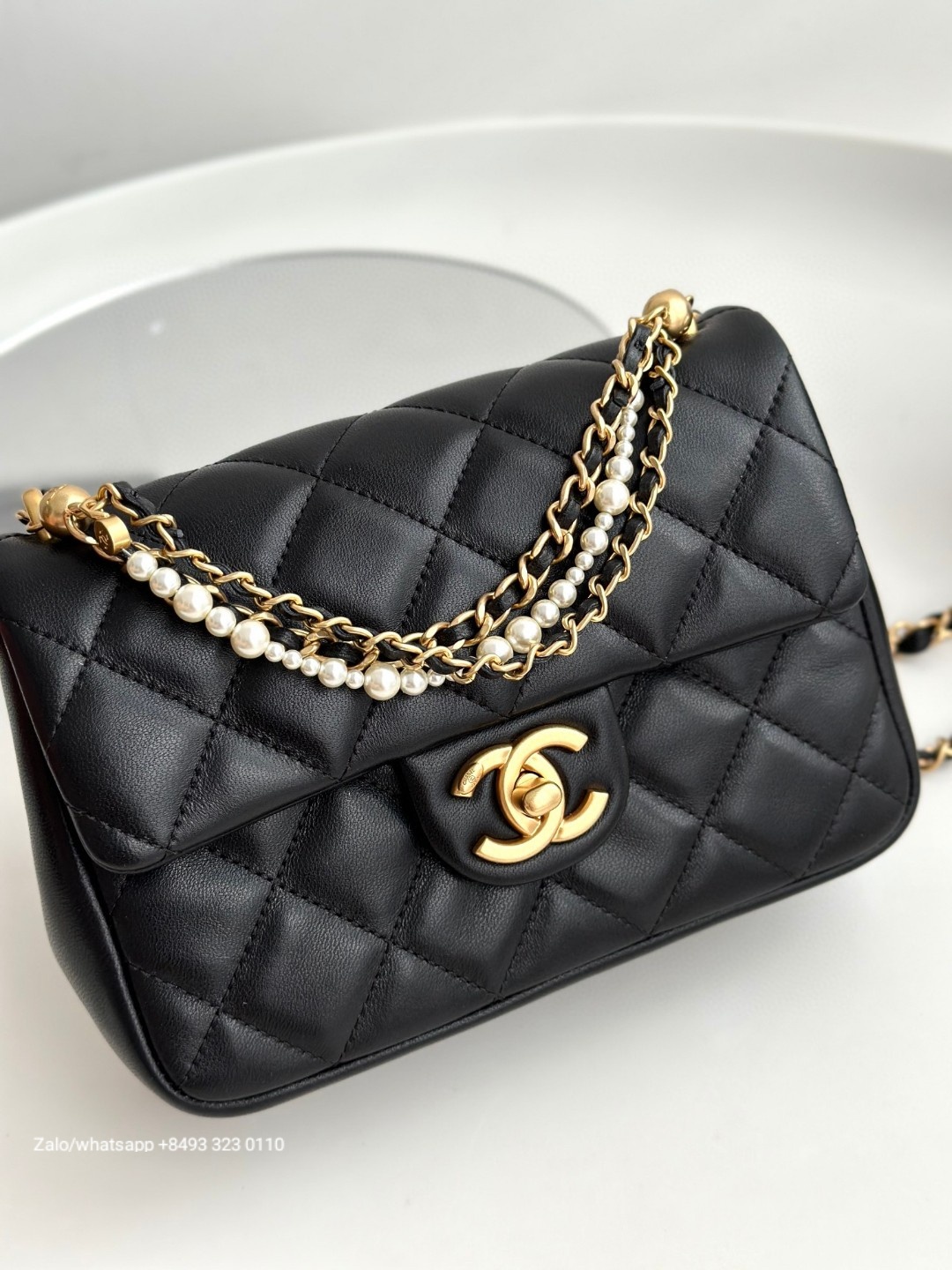 CHANEL FLAP BAG WITH TOP HANDLE Shiny Lambskin, Imitation Pearls & Gold-Tone Metal Black