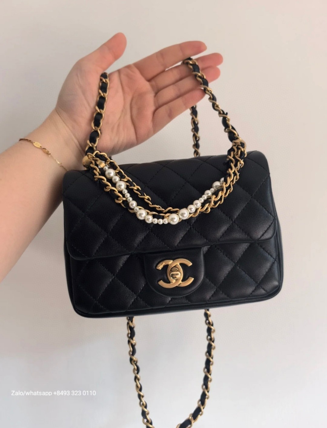 CHANEL Small FLAP BAG WITH TOP HANDLE Shiny Lambskin, Imitation Pearls & Gold-Tone Metal Black