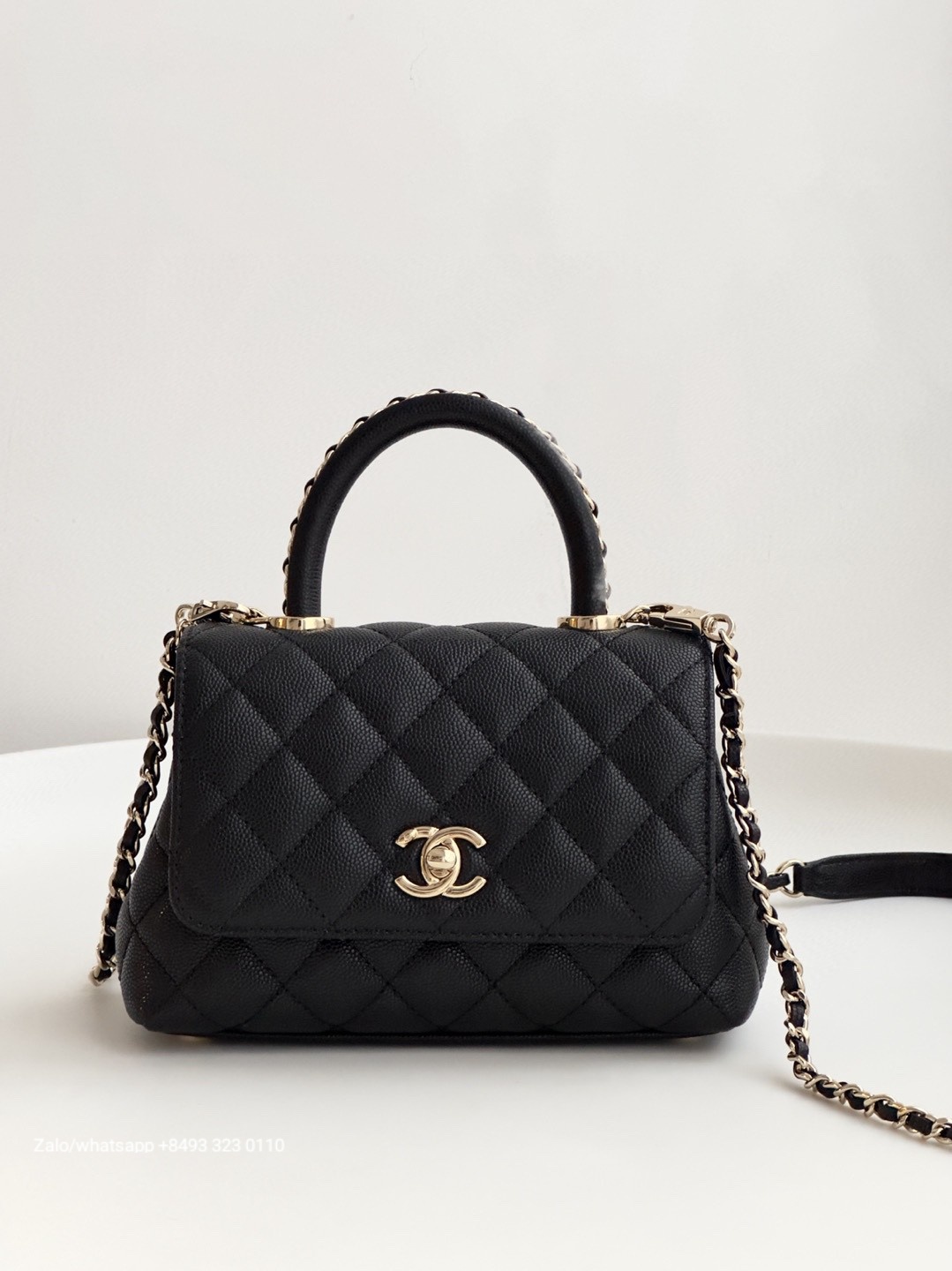 CHANEL 23A mini Coco handle bag Grained Calfskin Gold-Tone Metal Black