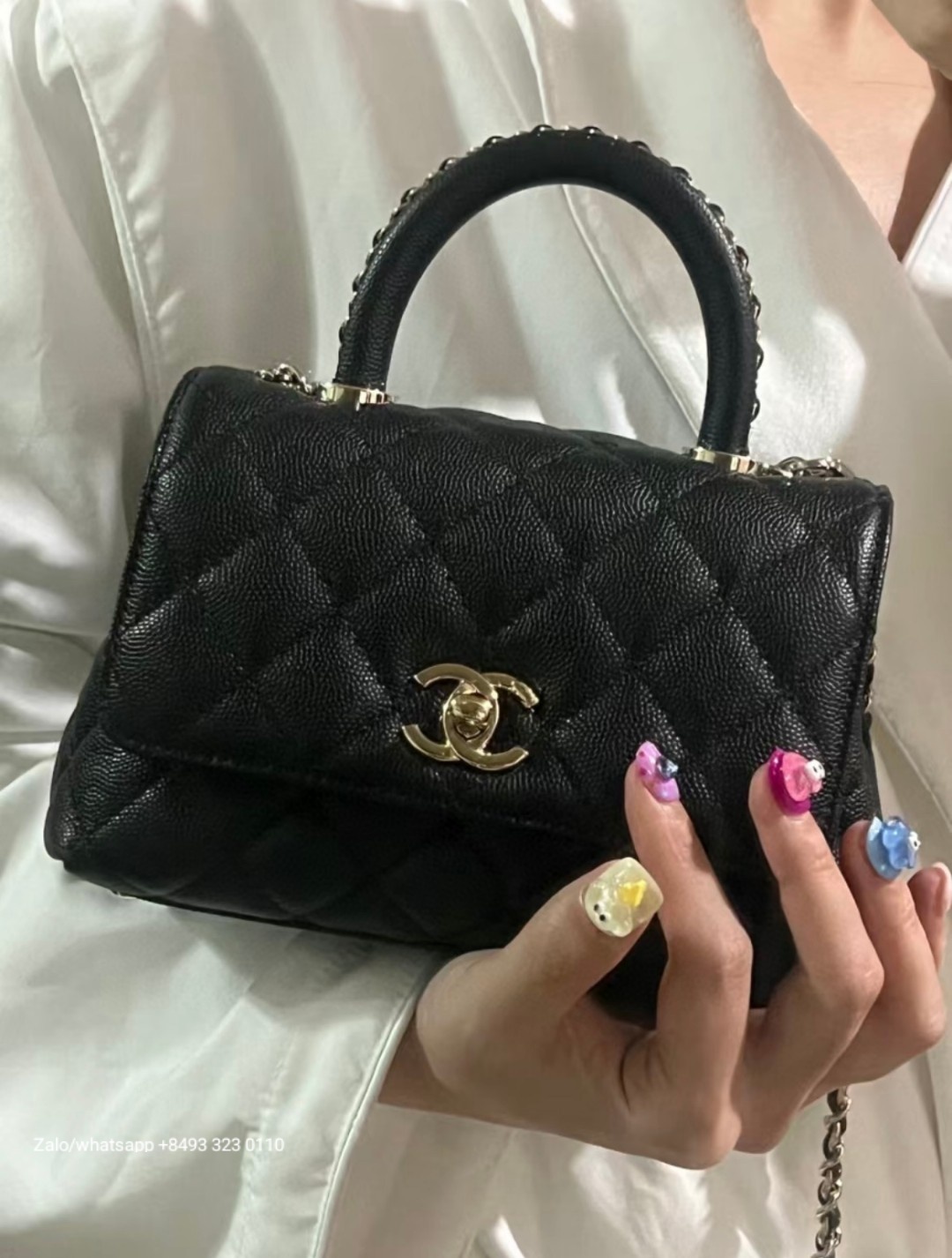 CHANEL 23A mini Coco handle bag Grained Calfskin Gold-Tone Metal Black