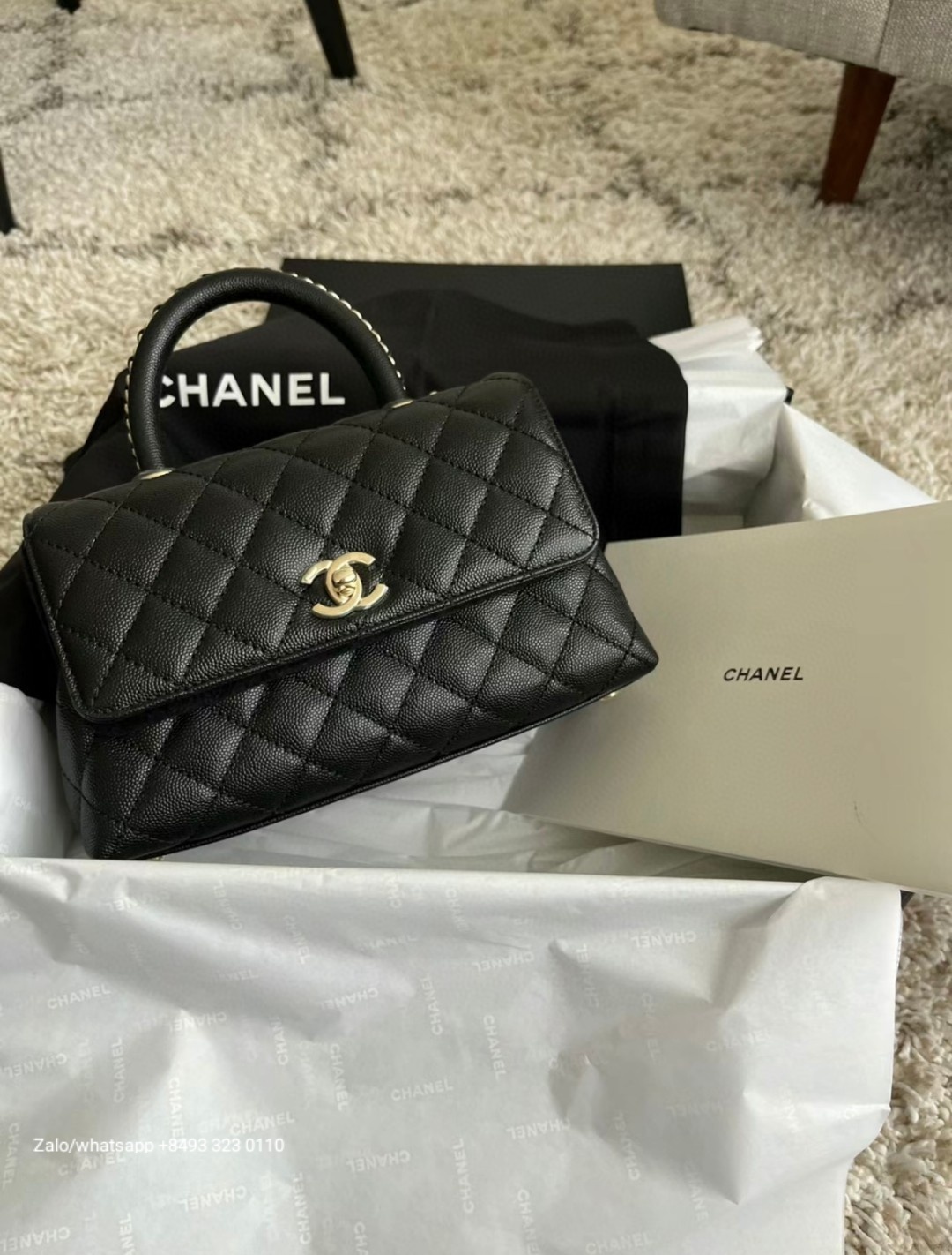 CHANEL 23A Medium Coco handle bag Grained Calfskin Gold-Tone Metal Black