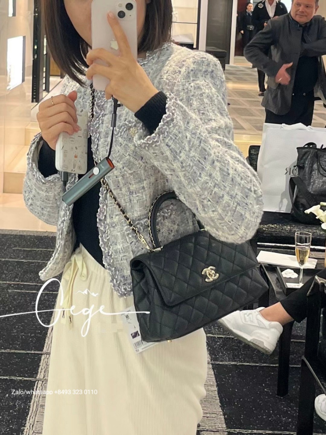 CHANEL 23A Medium Coco handle bag Grained Calfskin Gold-Tone Metal Black