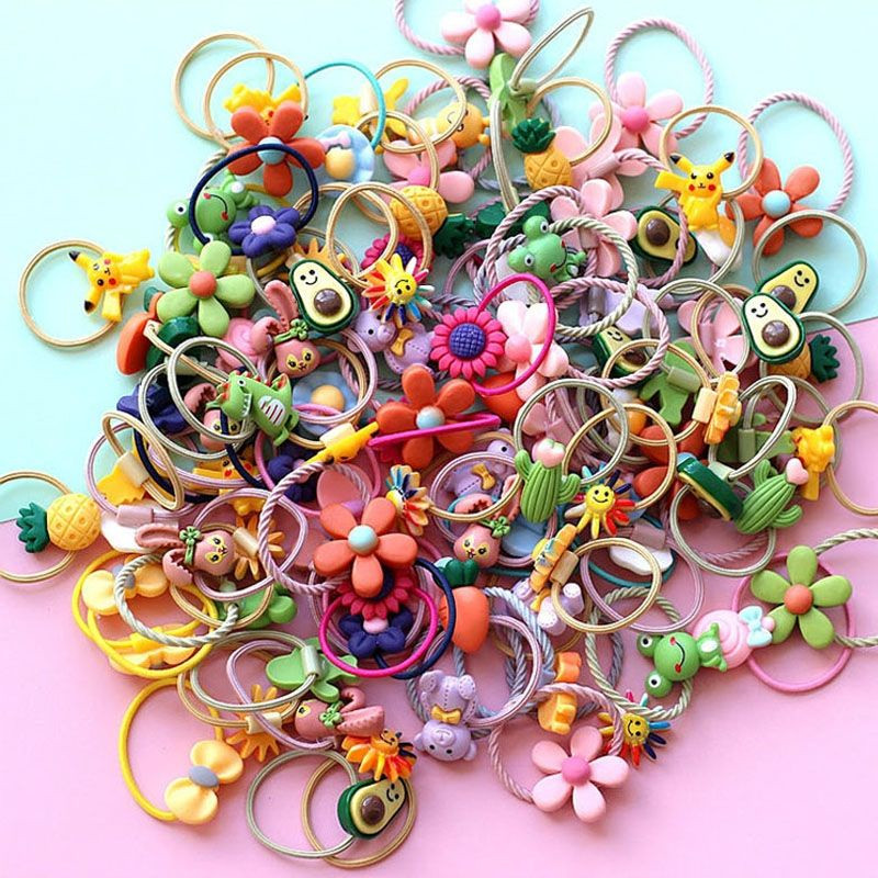 Set 50 dây buộc tóc gắn CHARM dễ thương kèm túi zip