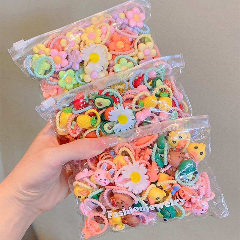 Set 50 dây buộc tóc gắn CHARM dễ thương kèm túi zip