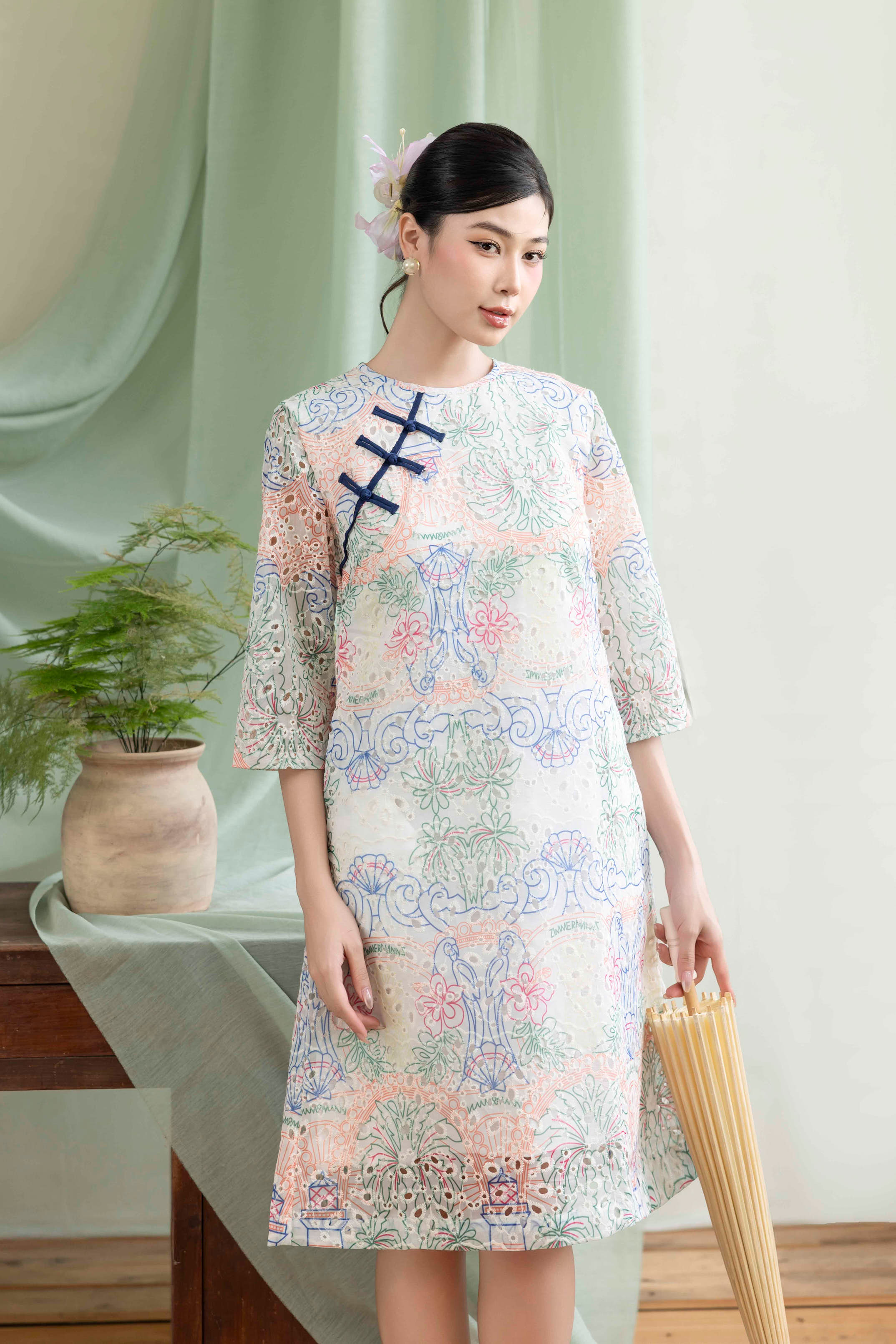 Đầm Tết Nút Tàu Tơ Thêu Đục Lỗ Phom A Hoạ Tiết Pastel - D12232LW01