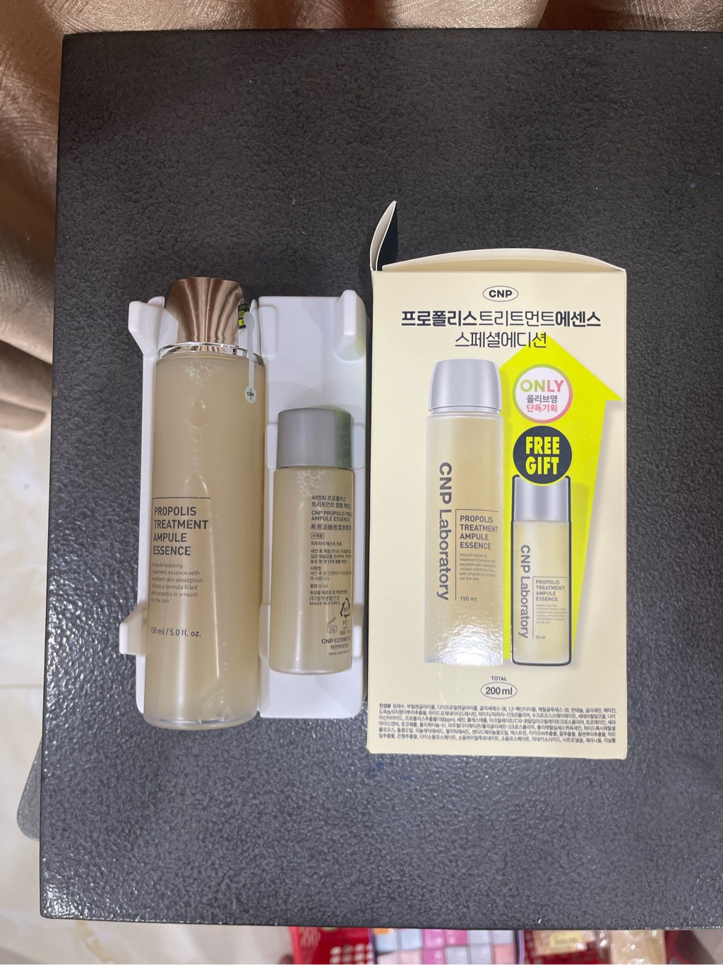 a64 - CNP - Set Nước Thần Keo Ong Propolis Treatment Ampoule Essence 150ml + 100ml