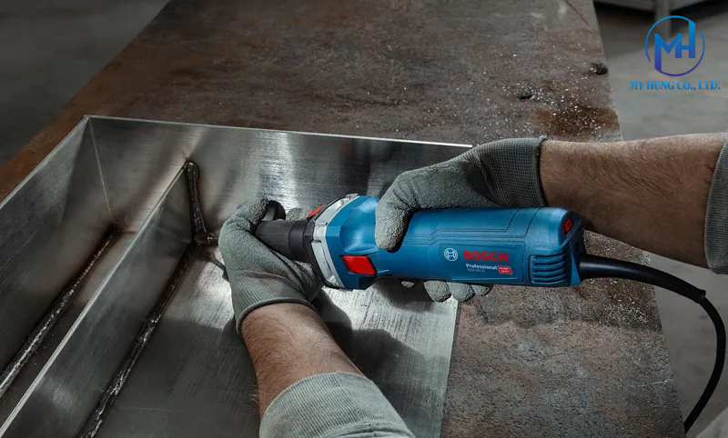 Trục cơ học thon dài và cụm nút khóa trục trên Bosch GGS 30 LS