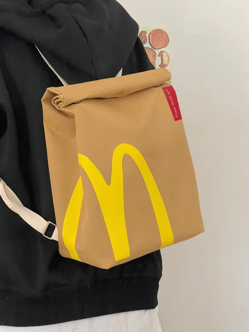 Balo túi xách, túi đeo Mcdonalds chữ M cho bé đi học, đi phượt phong cách Hàn Quốc