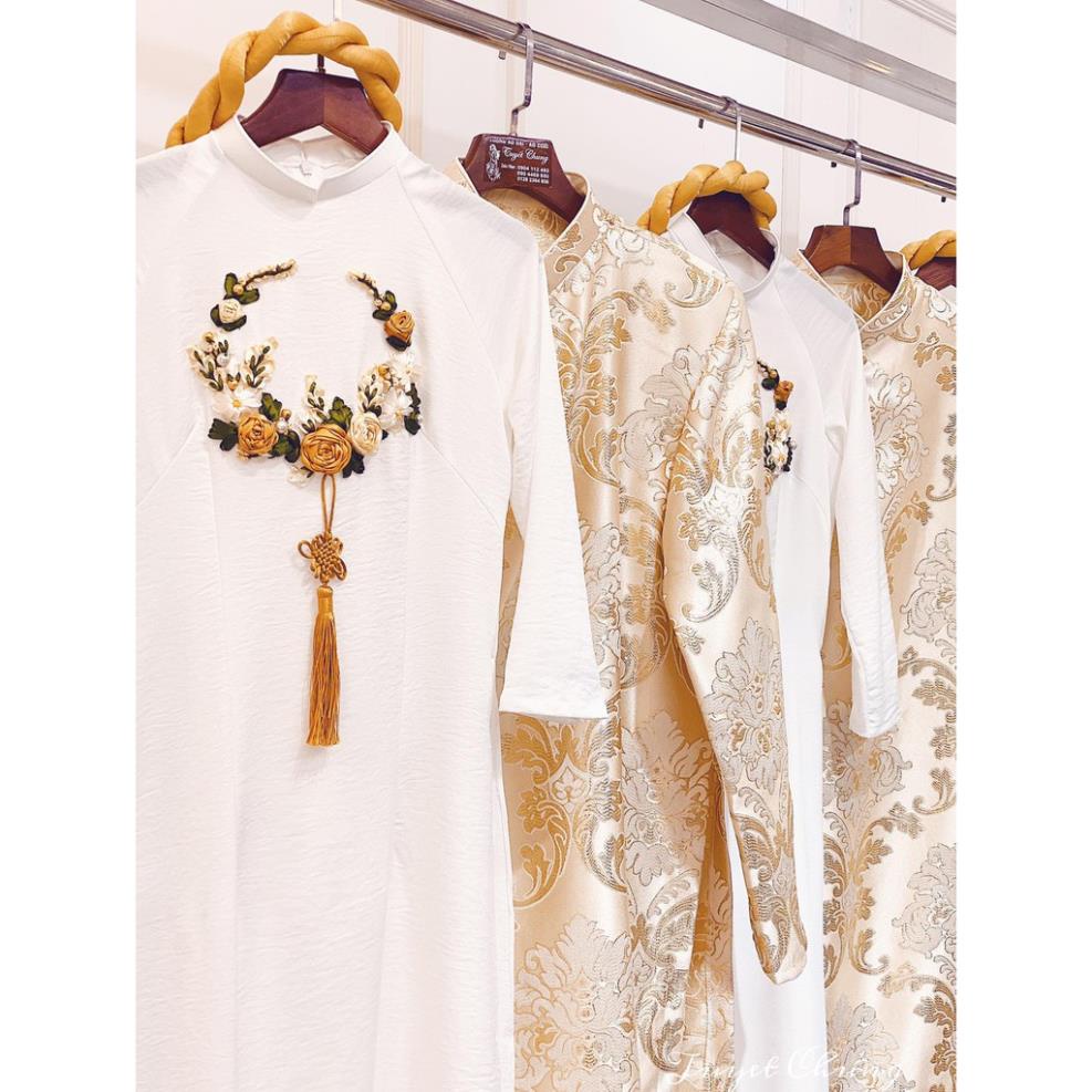 Áo dài vàng đồng Chaang May thiết kế vải áo dài lụa truyền thống đính hoa ruy băng dự tiệc lễ tết đẹp
