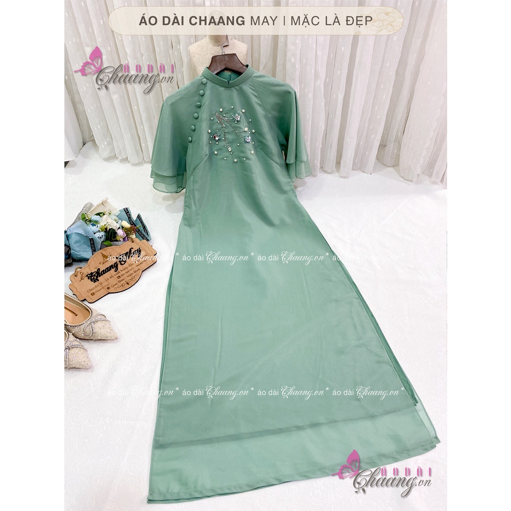 Áo Dài Tết Cách Tân Nữ Mộc Miên Thêu Cành Hoa Mai Đào Khoe Sắc Đẹp Trên Nền Lụa Tơ 4 Tà Cao Cấp
