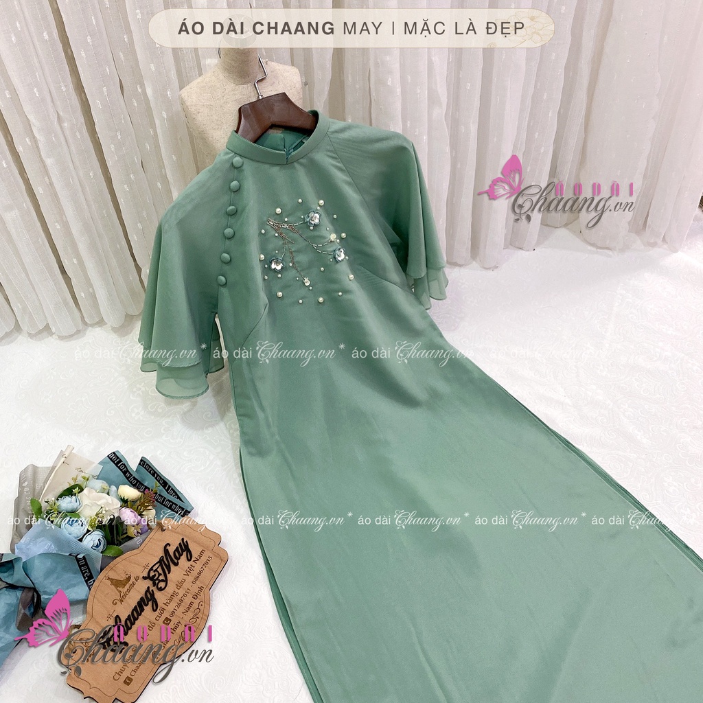 Áo Dài Tết Cách Tân Nữ Mộc Miên Thêu Cành Hoa Mai Đào Khoe Sắc Đẹp Trên Nền Lụa Tơ 4 Tà Cao Cấp
