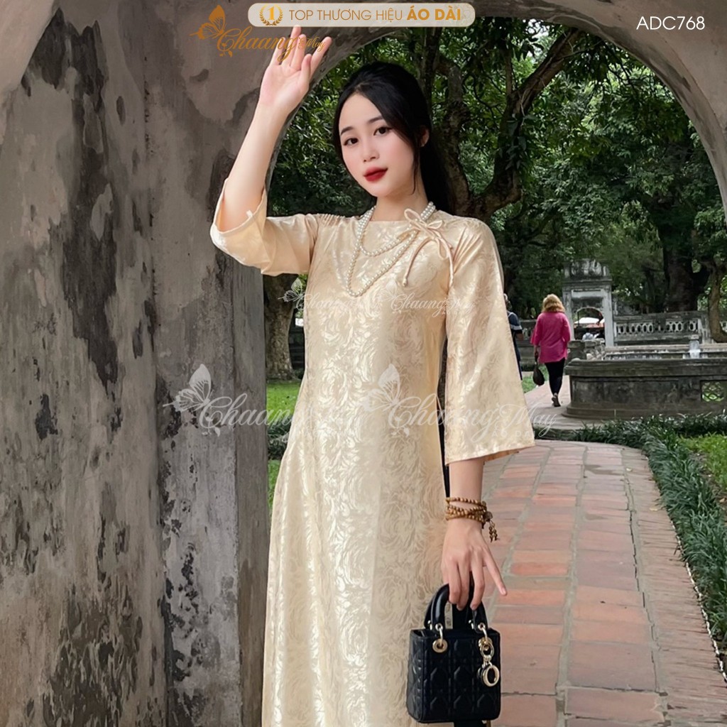 Áo dài gấm be Kem cách tân nữ dáng suông xưa Chaang may sẵn áo dài xuông đính nơ bầu dự tiệc cưới hỏi lễ tết đẹp ADC768