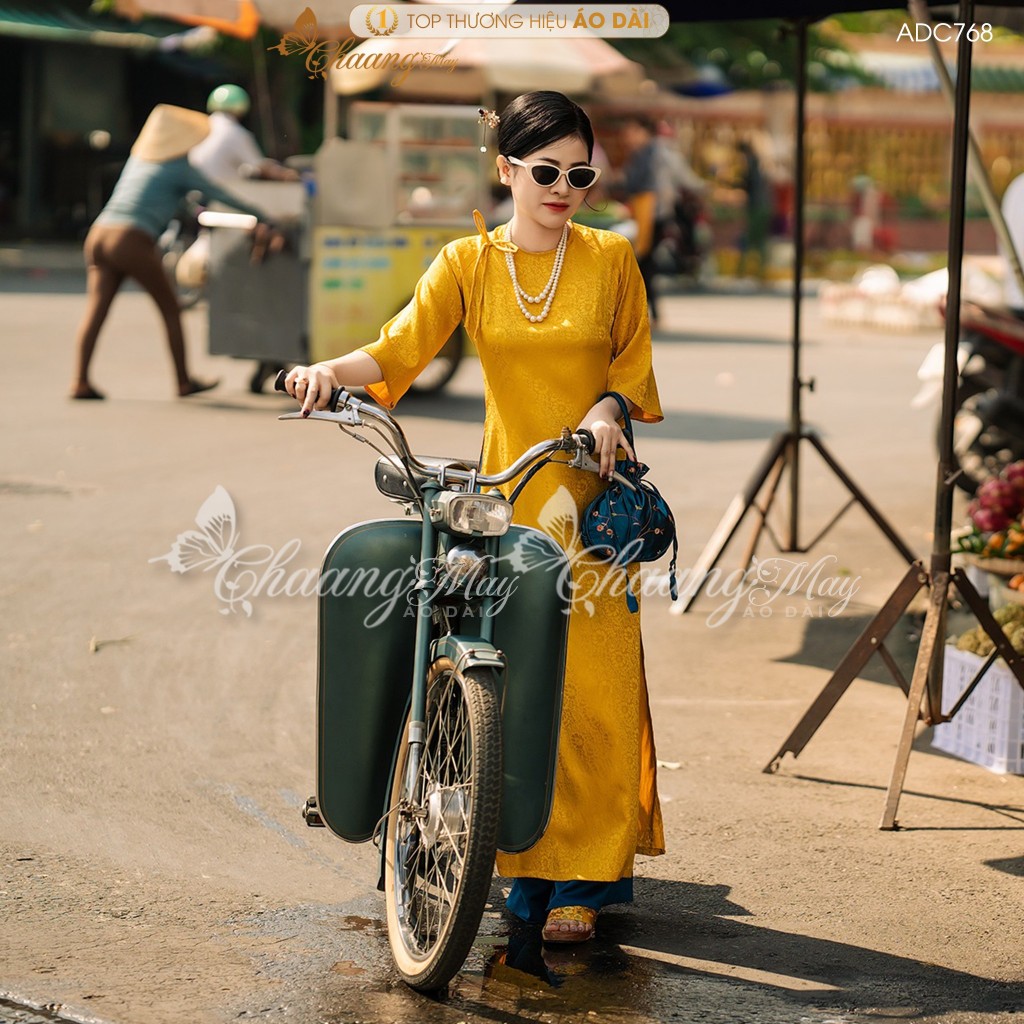 Áo dài cách tân nữ Gấm tơ nơ hoa Vàng dáng suông xưa Chaang may sẵn áo dài xuông bầu dự tiệc cưới hỏi lễ tết đẹp ADC768