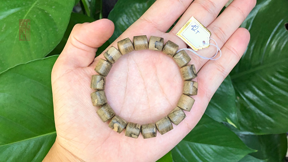 vòng tay trầm hương banh bông dạng hạt lu thống