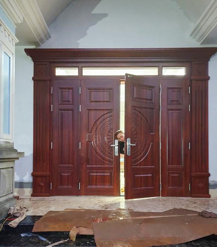 Cửa thép vân gỗ 4 cánh huỳnh trống đồng Phào Luxury
