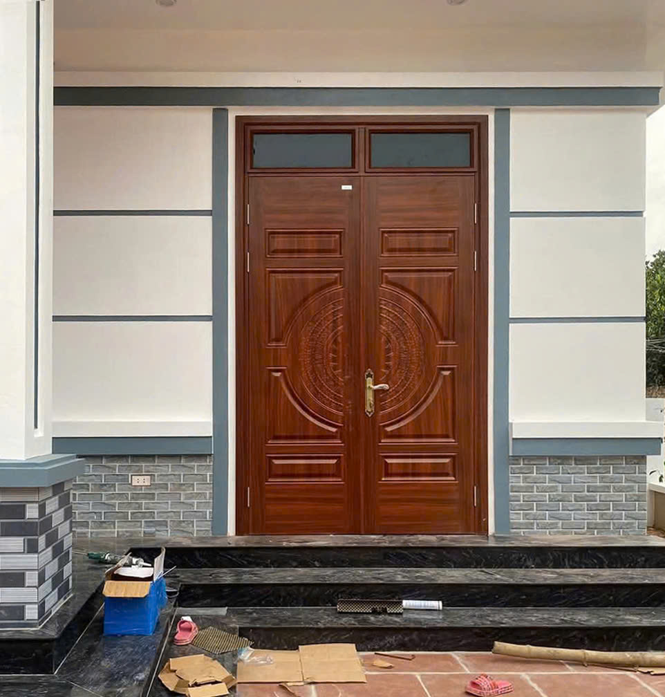 Cửa thép 2 cánh huỳnh trống đồng