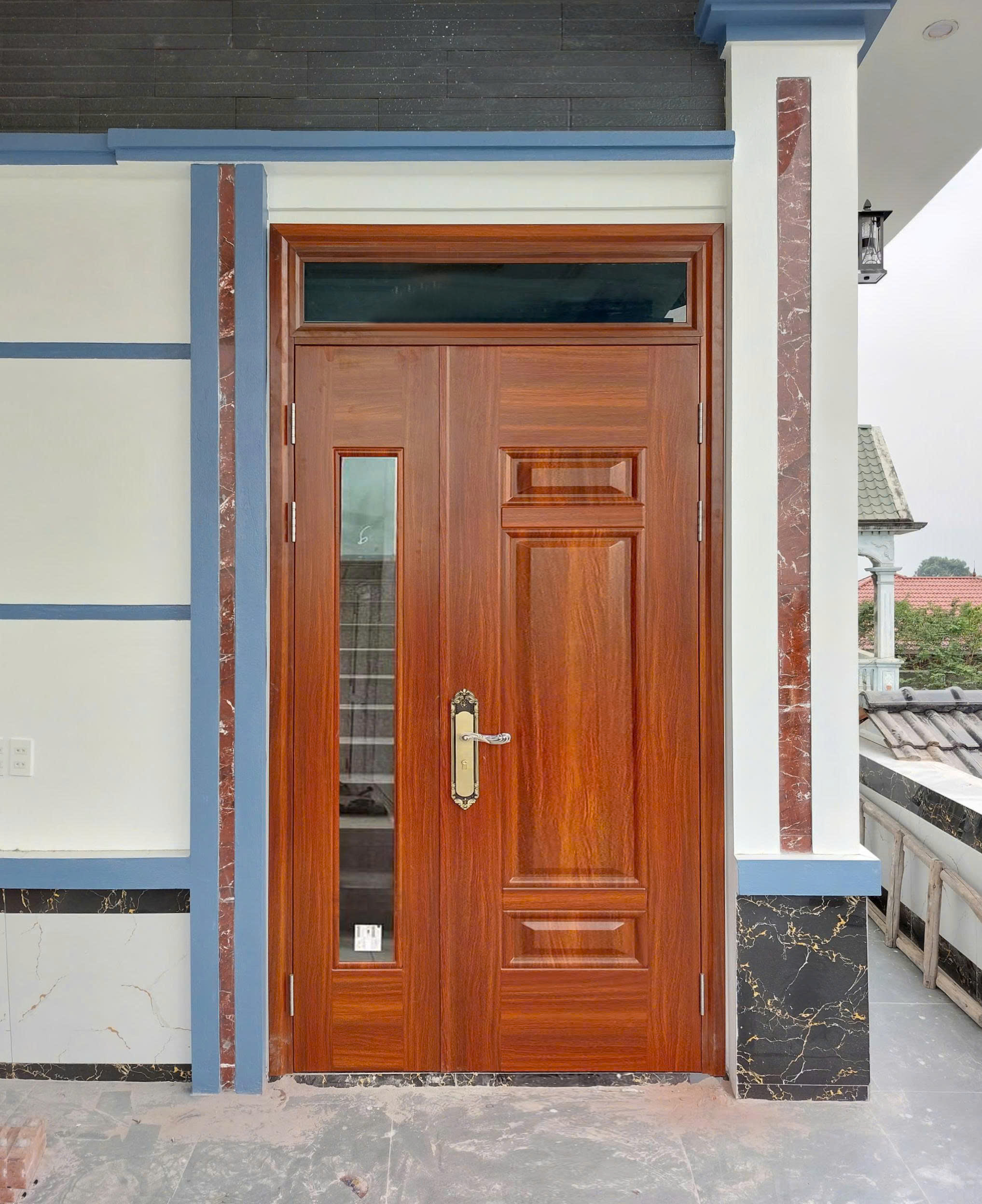 Cửa thép vân gỗ 2 cánh lệch
