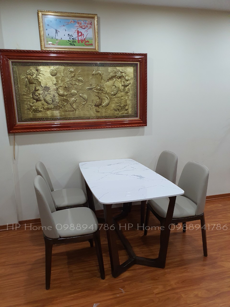 Bàn ăn đá tràn chân sồi 4 ghế bọc đệm da