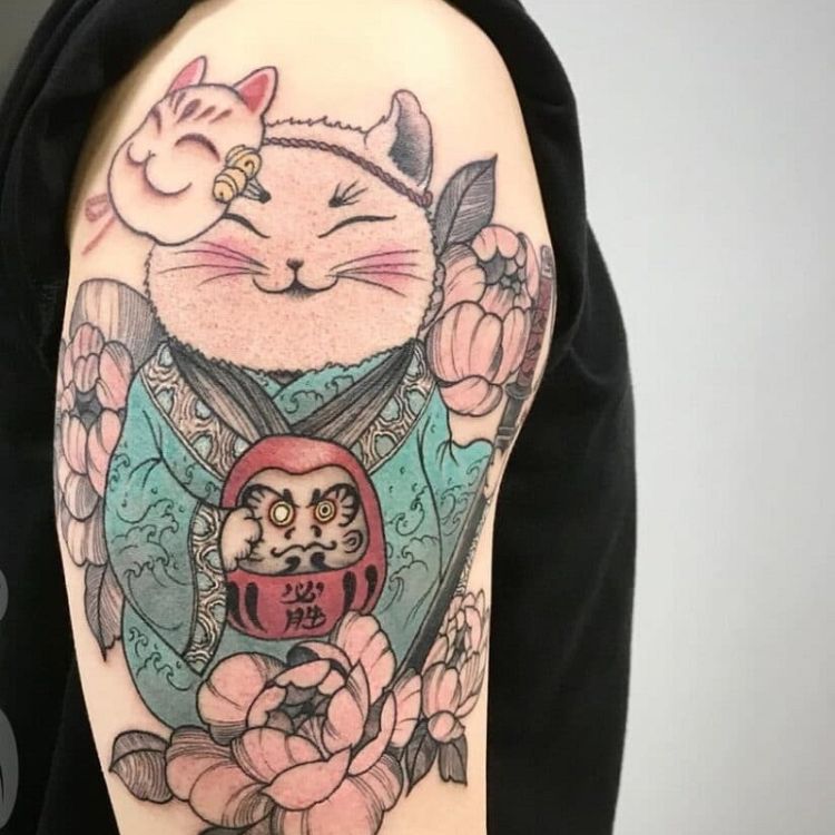 Daruma với mèo