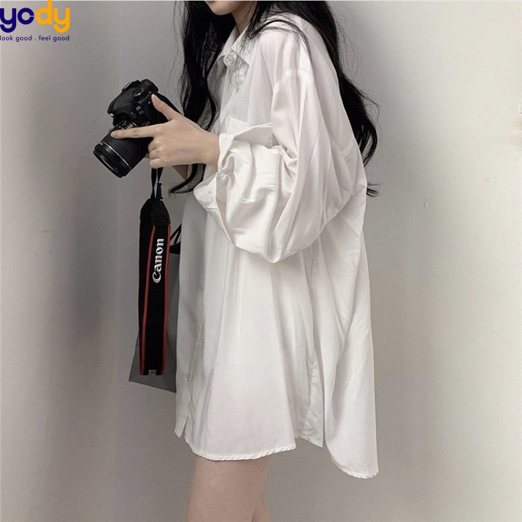 Sơ mi trắng giấu quần