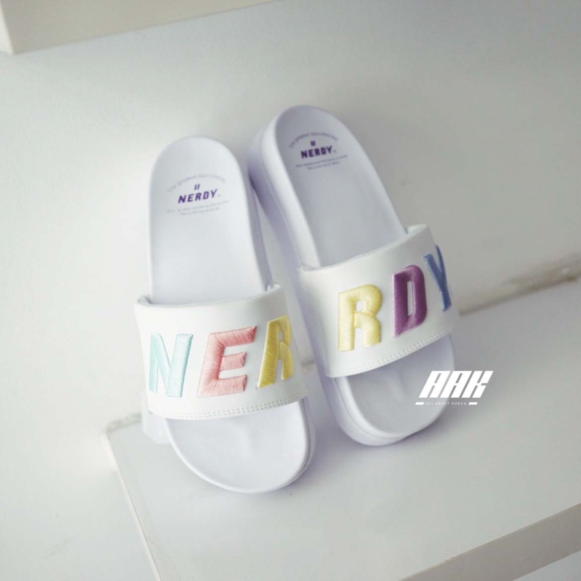 Nerdy Rainbow Slides - PNES22AE180