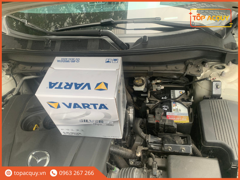 thay ắc quy xe mazda