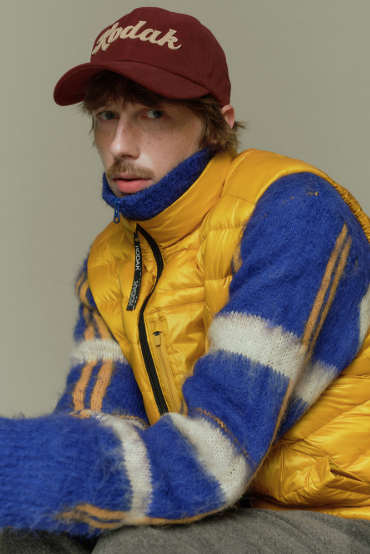 Áo khoác gile lông vũ Kodak