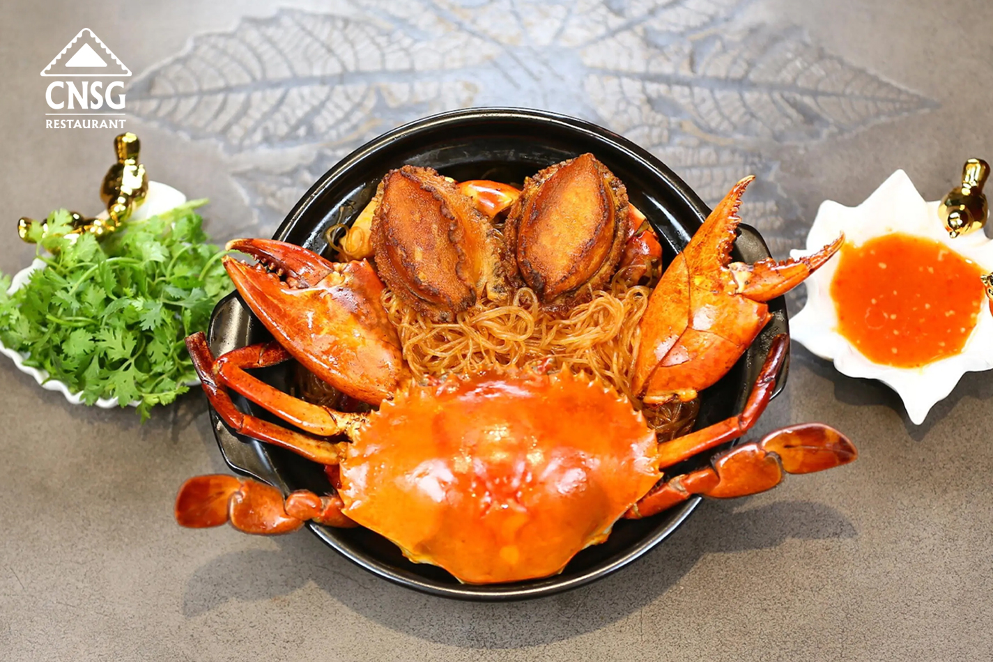 Cua xào miến bào ngư tay cầm