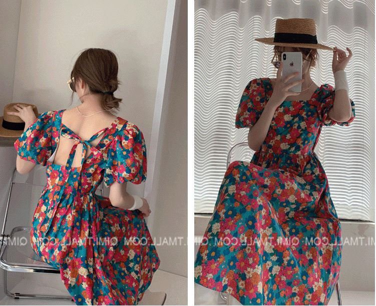 Đầm hoa cam cổ vông dây lưng tay bồng