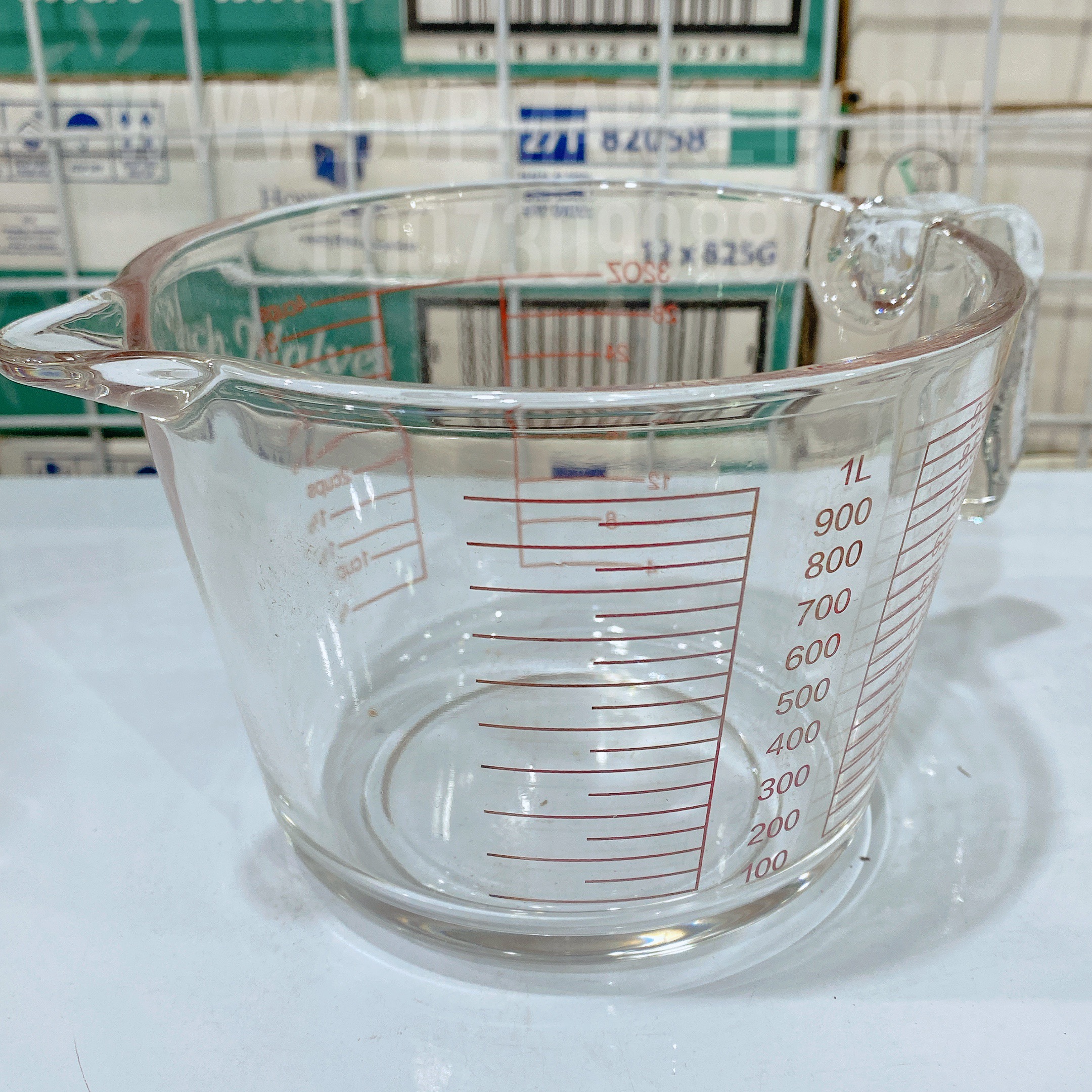 Ca đong thủy tinh - Chữ dỏ - HK (1000ml)