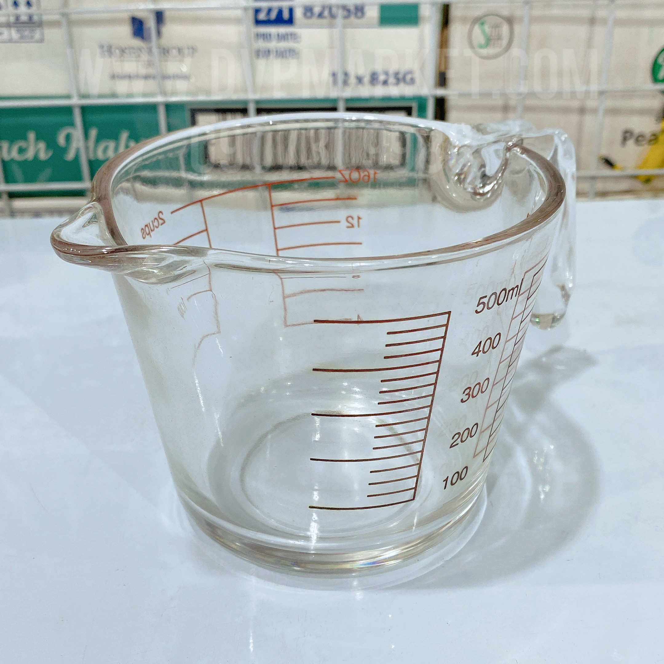 Ca đong thủy tinh - Chữ dỏ - HK (500ml)