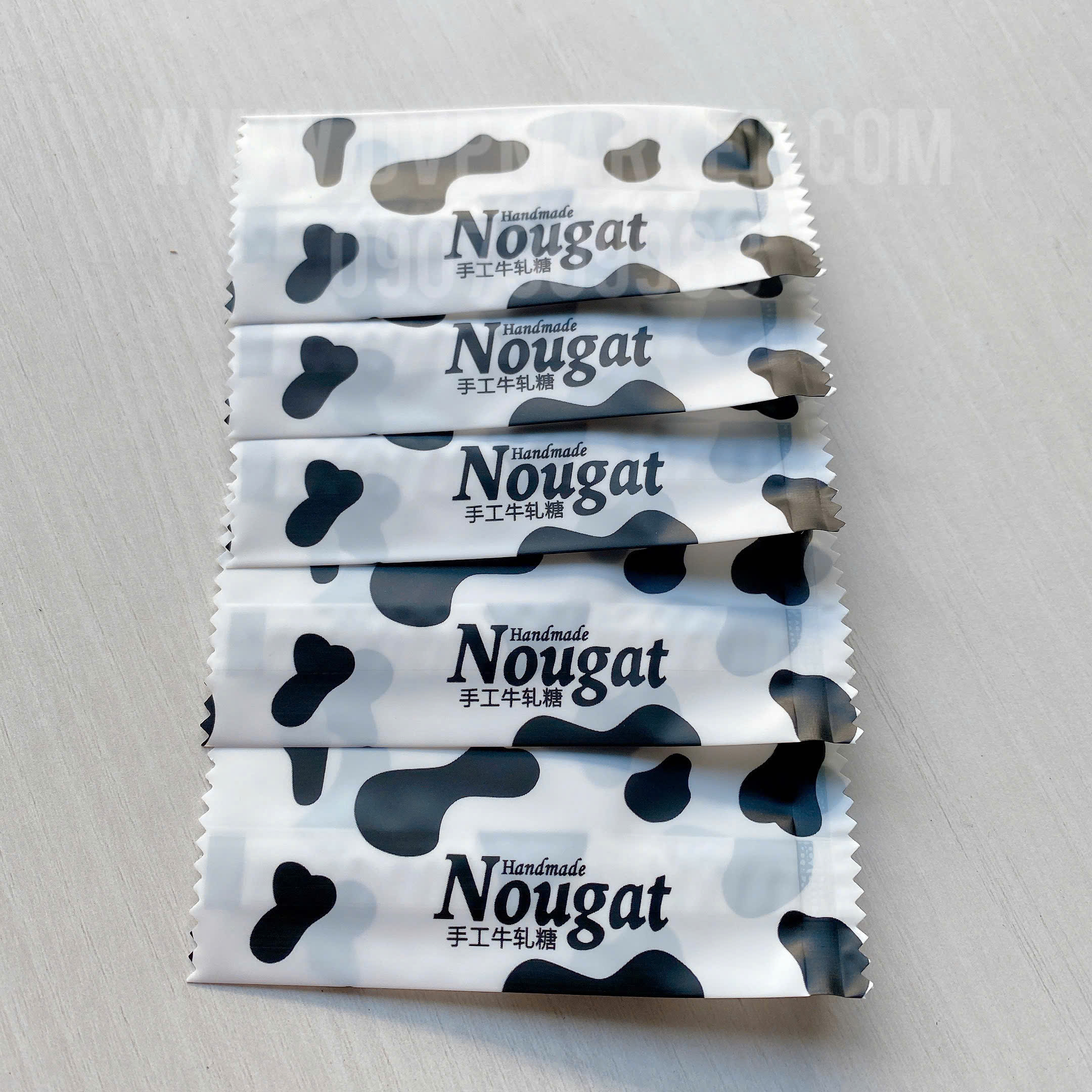 Túi hàn kẹo nougat 4x9.5cm - bò sữa (xấp 200)