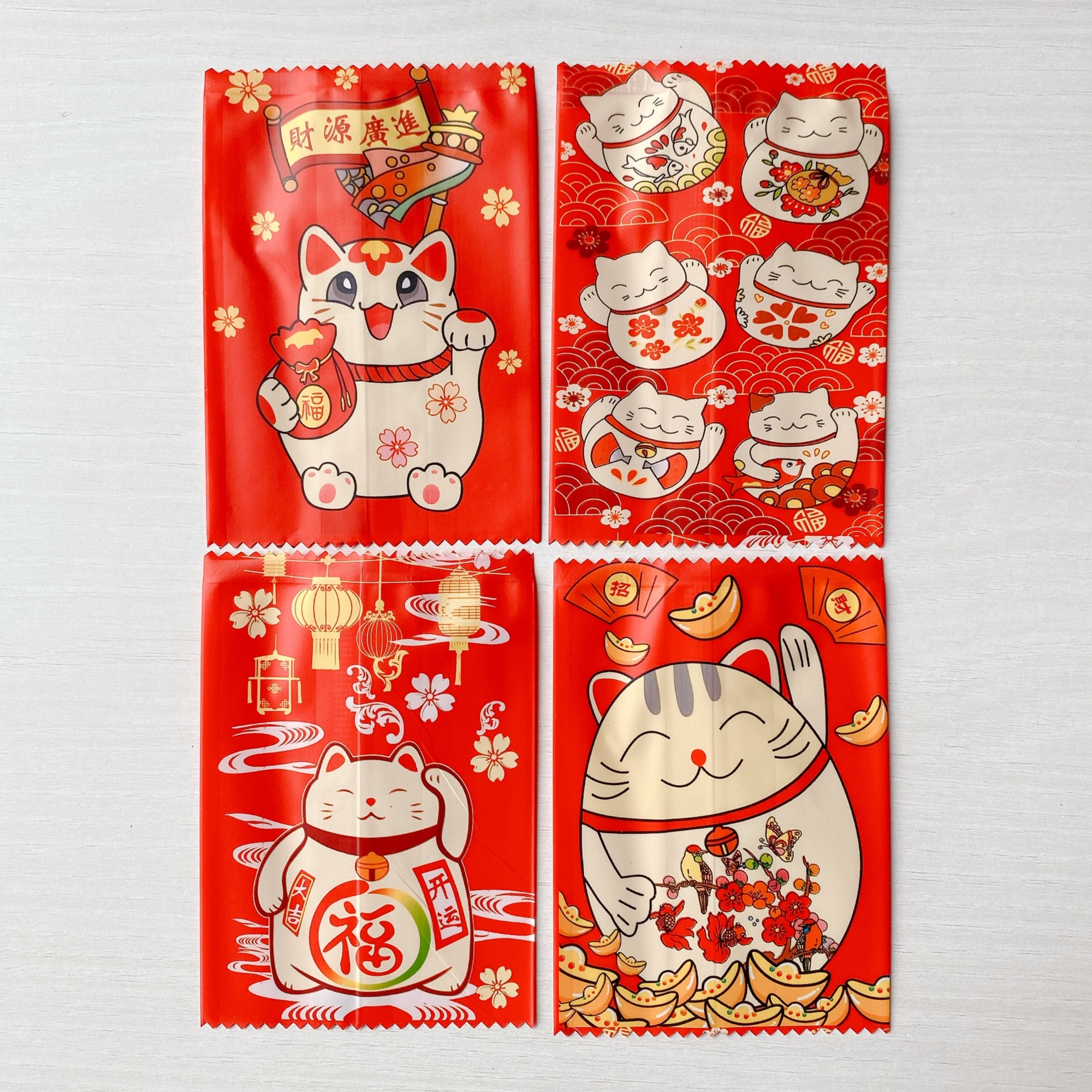 Túi hàn bánh quy - kẹo 7x10cm mèo thần tài đỏ (Xấp 100)