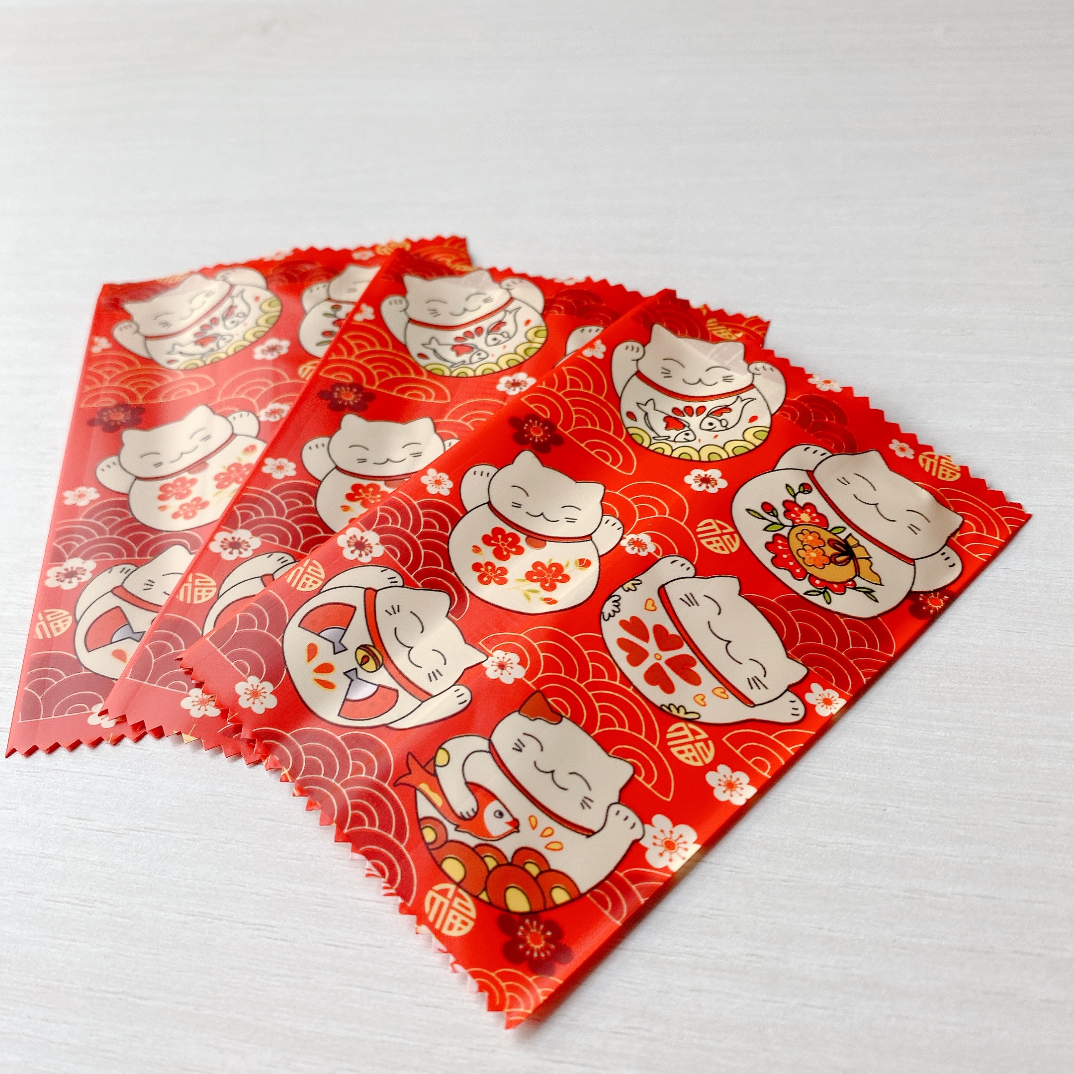 Túi hàn bánh quy - kẹo 7x10cm mèo thần tài đỏ (Xấp 100)