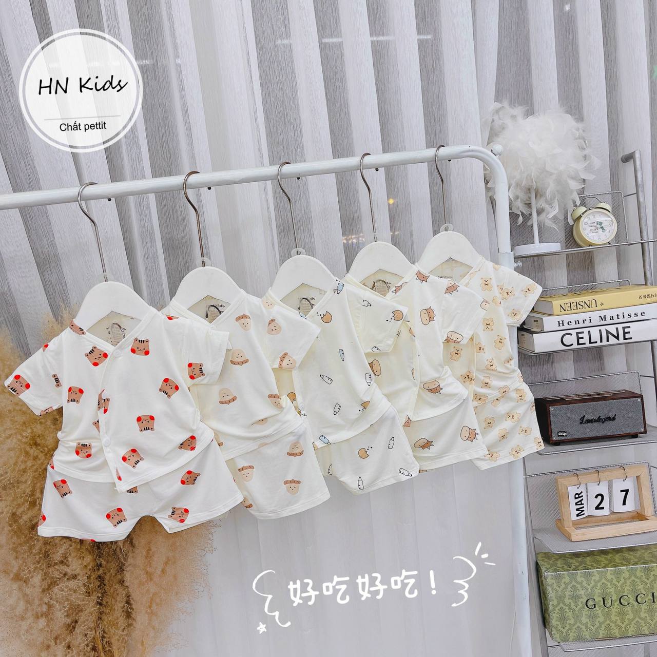 Bộ cộc cúc lệch HN Kids trắng in ful họa tiết