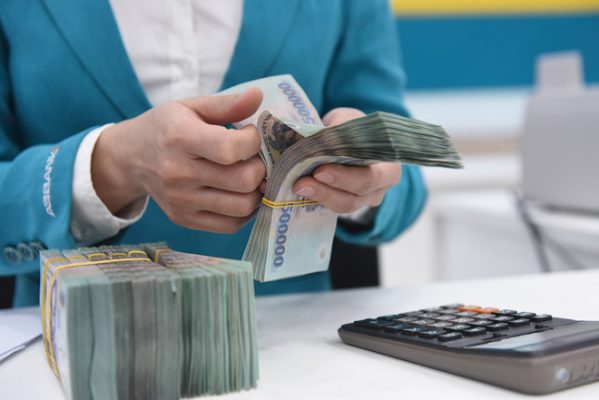 Góp vốn điều lệ bằng tiền mặt hay chuyển khoản?