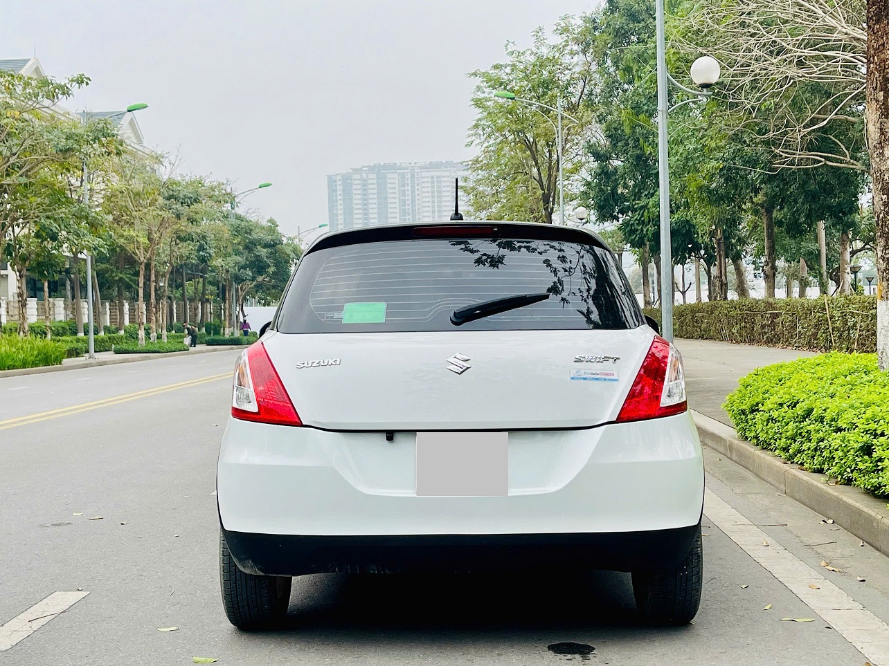 Suzuki Swift 1.4 AT 2016 trắng