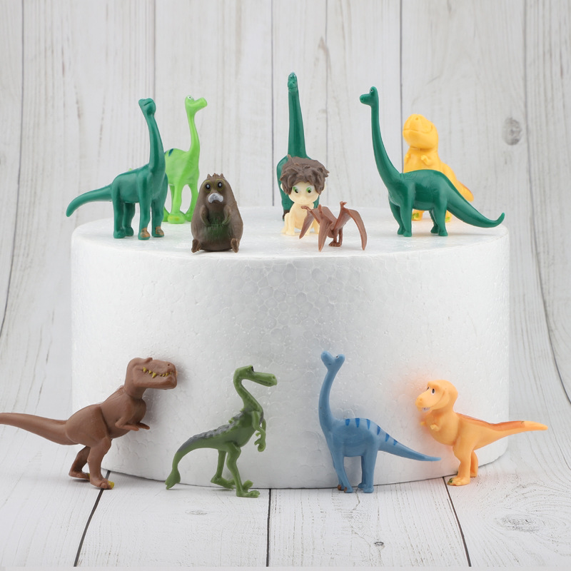 รูปปั้น- ไดโนเสาร์ตัวน้อยและเด็กชาย