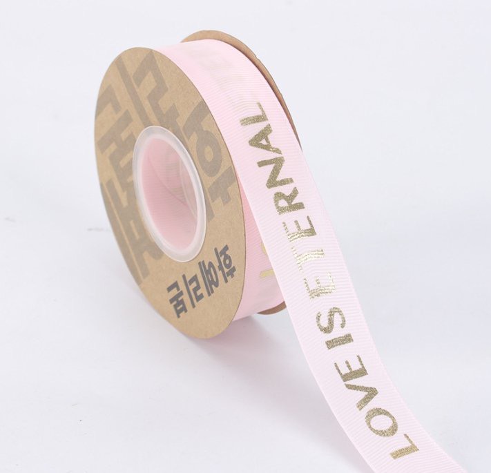 ริบบิ้น LOVE IS ETERNAL (2.5CM X 25M) - สีชมพู
