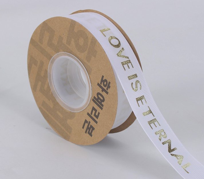 ริบบิ้น LOVE IS ETERNAL (2.5CM X 25M) - สีขาว