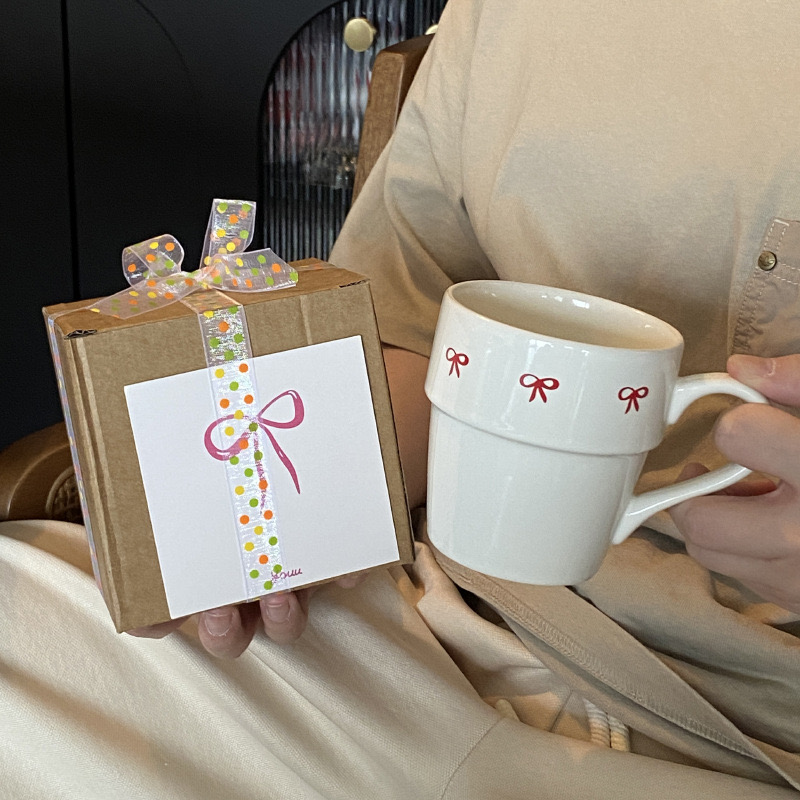 Cốc sứ nơ trắng đen