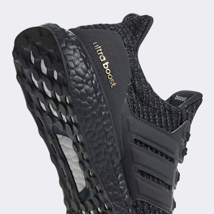 Adidas ultra boost top triple black giá