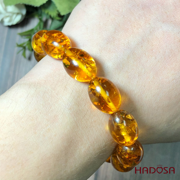 Vòng Hổ Phách Baltic vàng cognac hạt olive 11*14